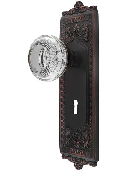 Egg and Dart Style Door Set with Ovolo Crystal-Glass Knobs and Keyhole in Timeless Bronze.